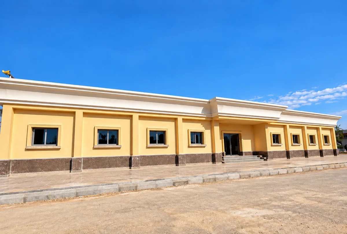 Central Police Camp — A long facade with repeated window surrounds and continuous cornices.