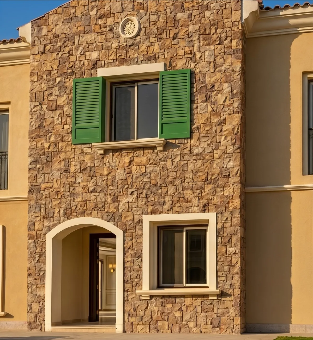 Emaar Mivida Compound — stone facade and framed windows